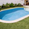 piscina oval no quintal